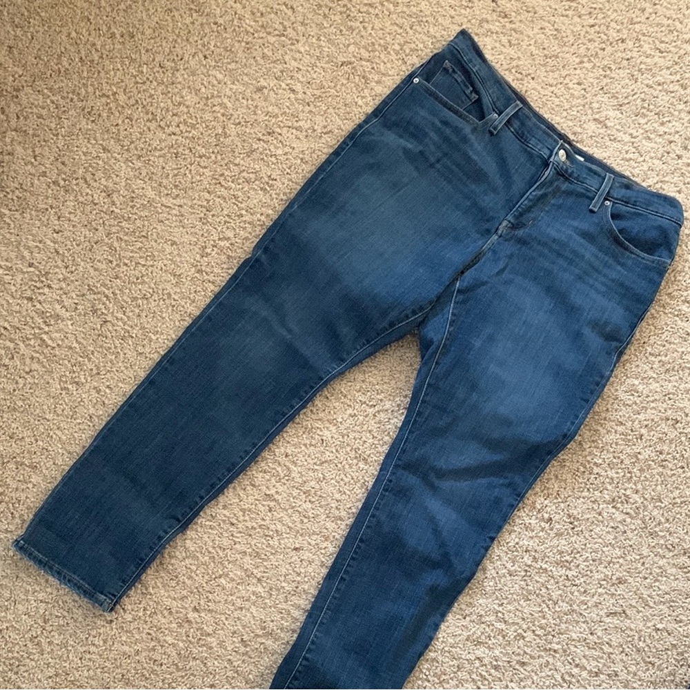 Stylish and comfortable women's Levi’s 311 Shaping skinny size 14w blue jeans.